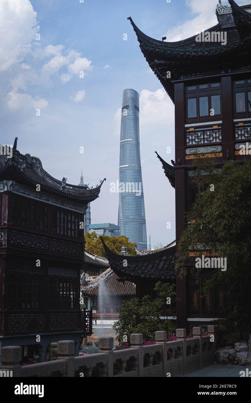 The Architectural contrast of modernized Shanghai and the old historical buildings in HuangPu District Stock Photo