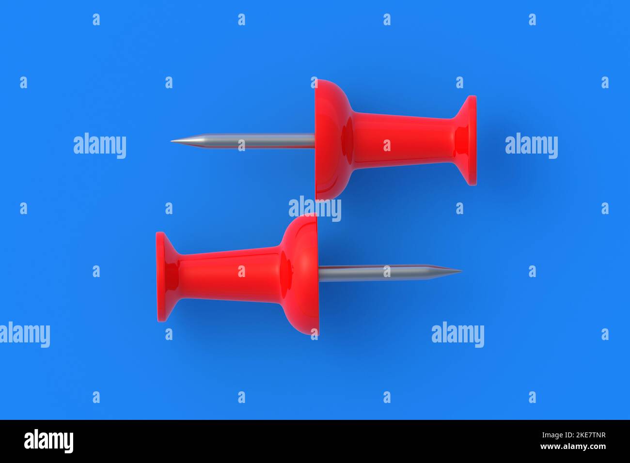 Push pins on blue background. Stationery tools. Office equipment ...