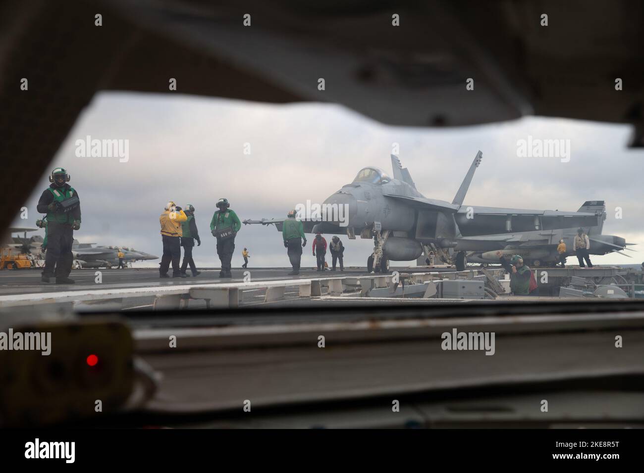 Sailors assigned to the first-in-class aircraft carrier USS Gerald R. Ford's (CVN 78) air department prepare an F/A-18E Super Hornet, attached to the 'Golden Warriors' of Strike Fighter Squadron (VFA) 87, to launch from Ford’s flight deck, Nov. 9, 2022. The Gerald R. Ford Carrier Strike Group is deployed in the Atlantic Ocean, conducting training and operations alongside NATO Allies and partners to enhance integration for future operations and demonstrate the U.S. Navy’s commitment to a peaceful, stable and conflict-free Atlantic region. (U.S. Navy photo by Mass Communication Specialist 2nd Cl Stock Photo