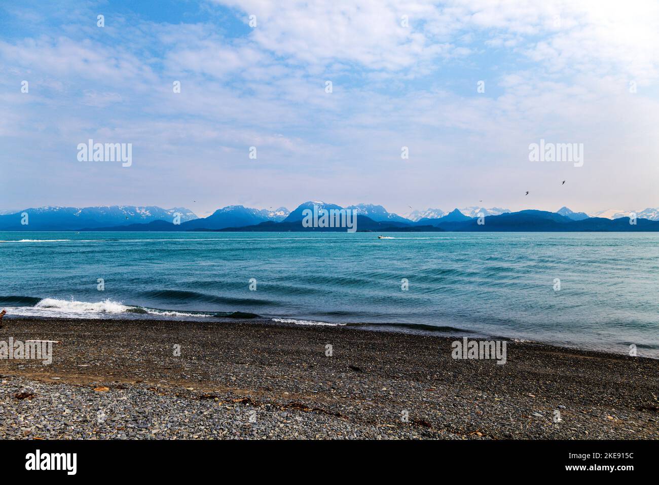 Fishing boat; foggy; misty; view of Kachemak Bay; Kenai Mountains
