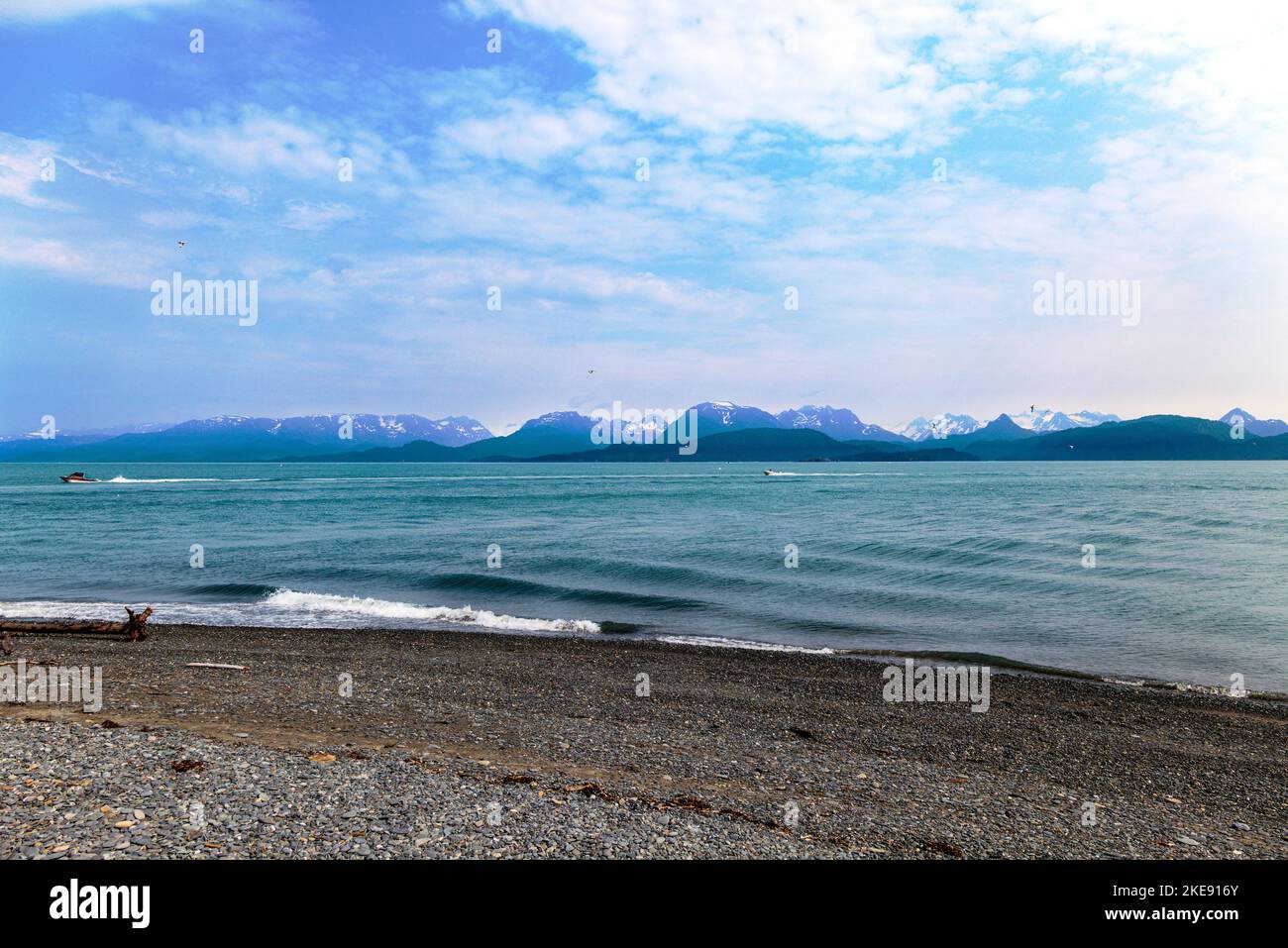 Fishing boat; foggy; misty; view of Kachemak Bay; Kenai Mountains; Homer; Alaska; USA Stock Photo
