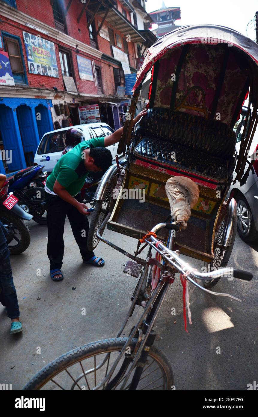 Nepali mechanic and technician professional rickshaw repair and