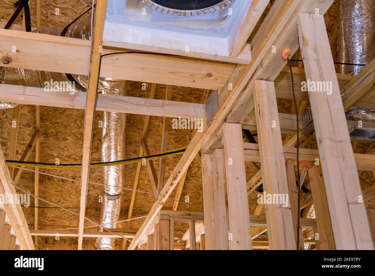 A new building under construction with installation of HVAC tubing