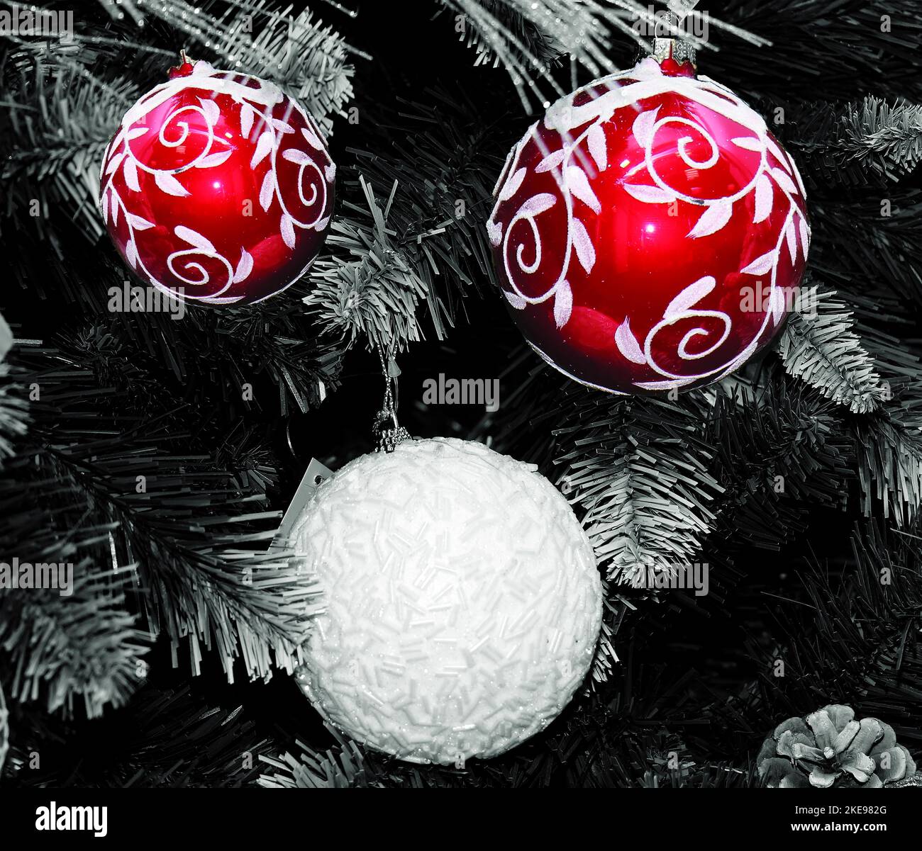 Christmas decor with red ornaments on black and white background Stock ...