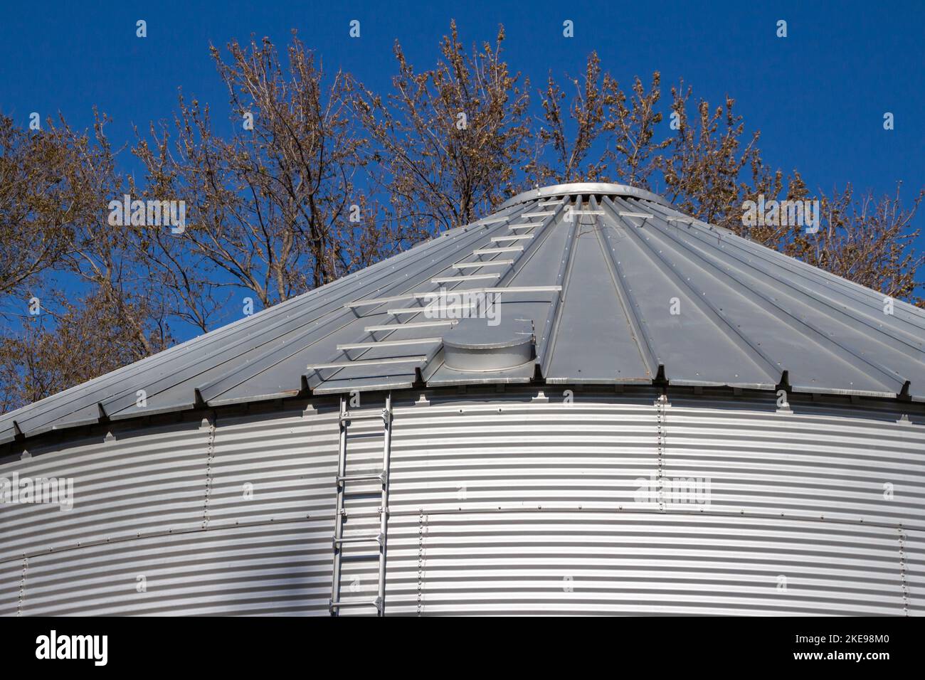 Close up view of a metal roof and corrugated steel siding on the round