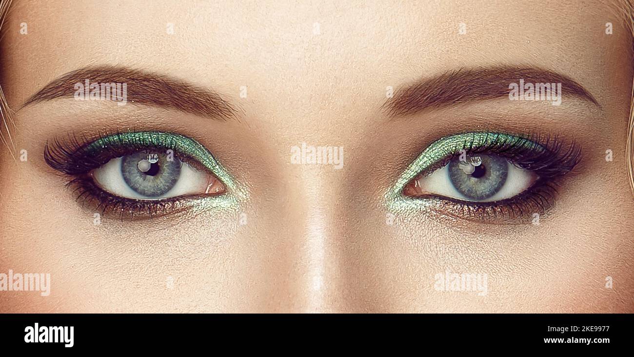 Beautiful female eyes with long eyelashes. Eyelash extensions. Makeup, Cosmetics, Beauty. Close up, Macro Stock Photo