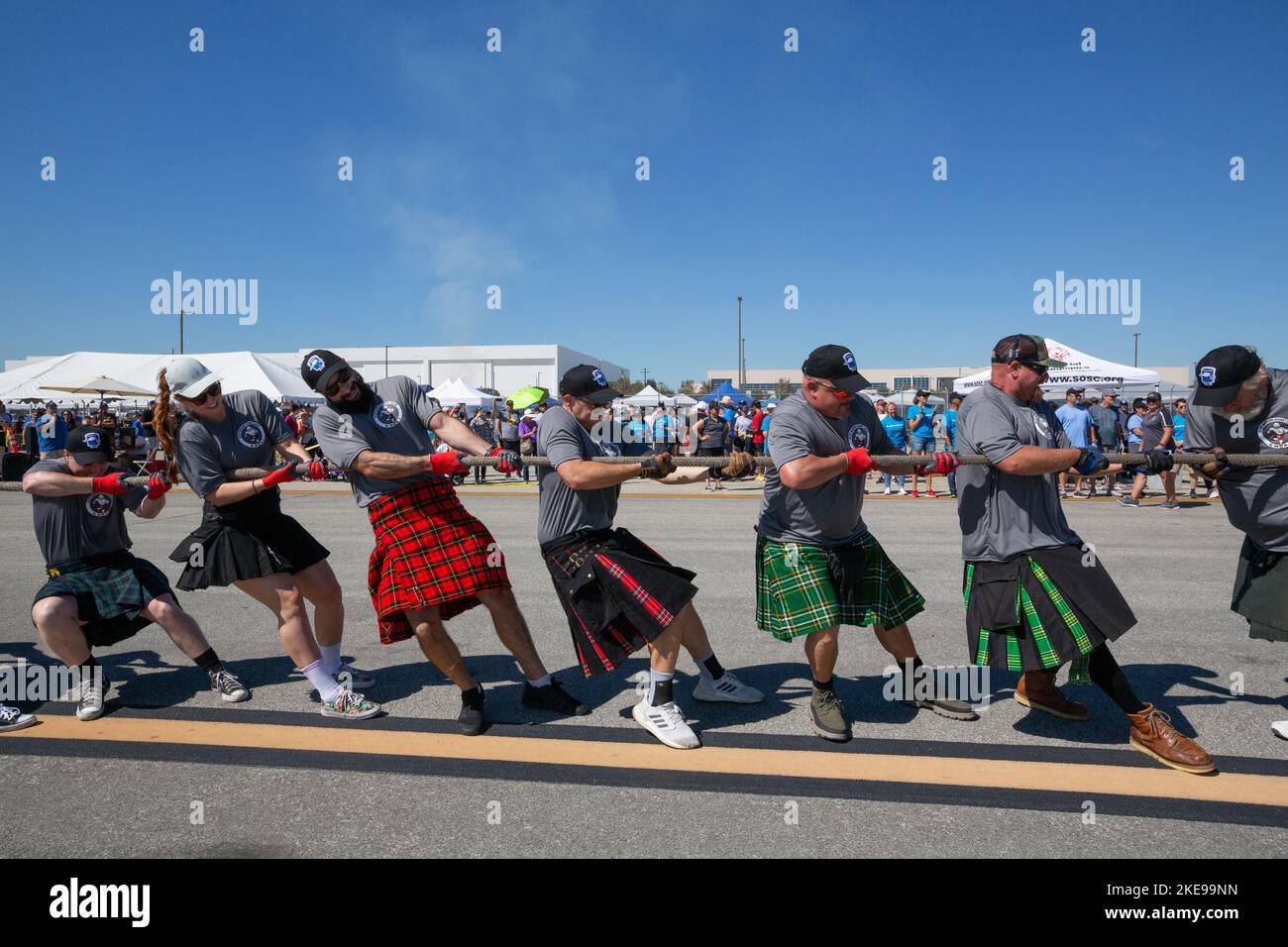 The Kilted Warriors Against Cancer team pulling a UPS plane at the ...