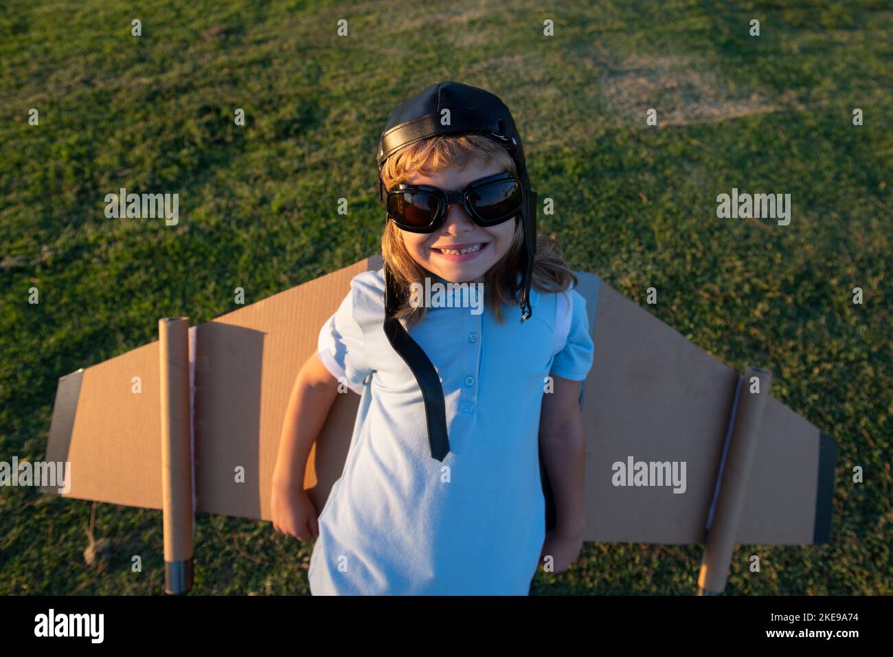 Portrait of child dreams of a rocket pilot. Imagination and