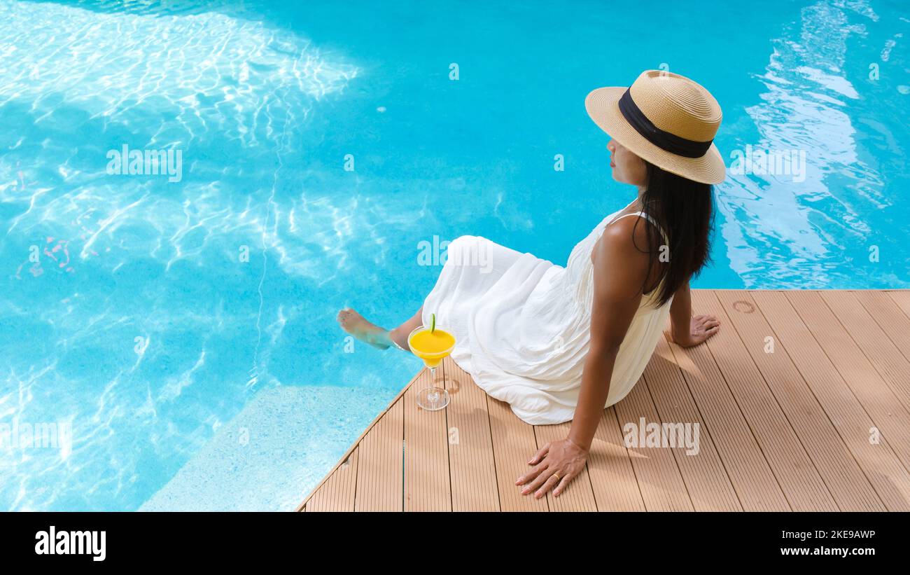 Thai woman swimming pool hi-res stock photography and images - Alamy