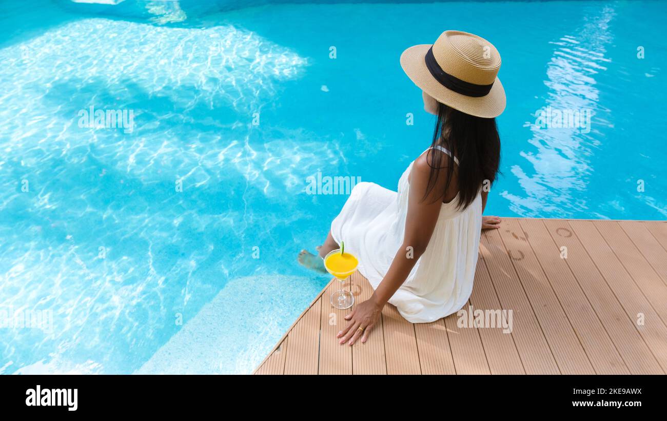 Thai woman swimming pool hi-res stock photography and images - Alamy
