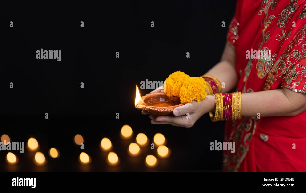 Traditional diya lamps lit during diwali celebration Stock Photo