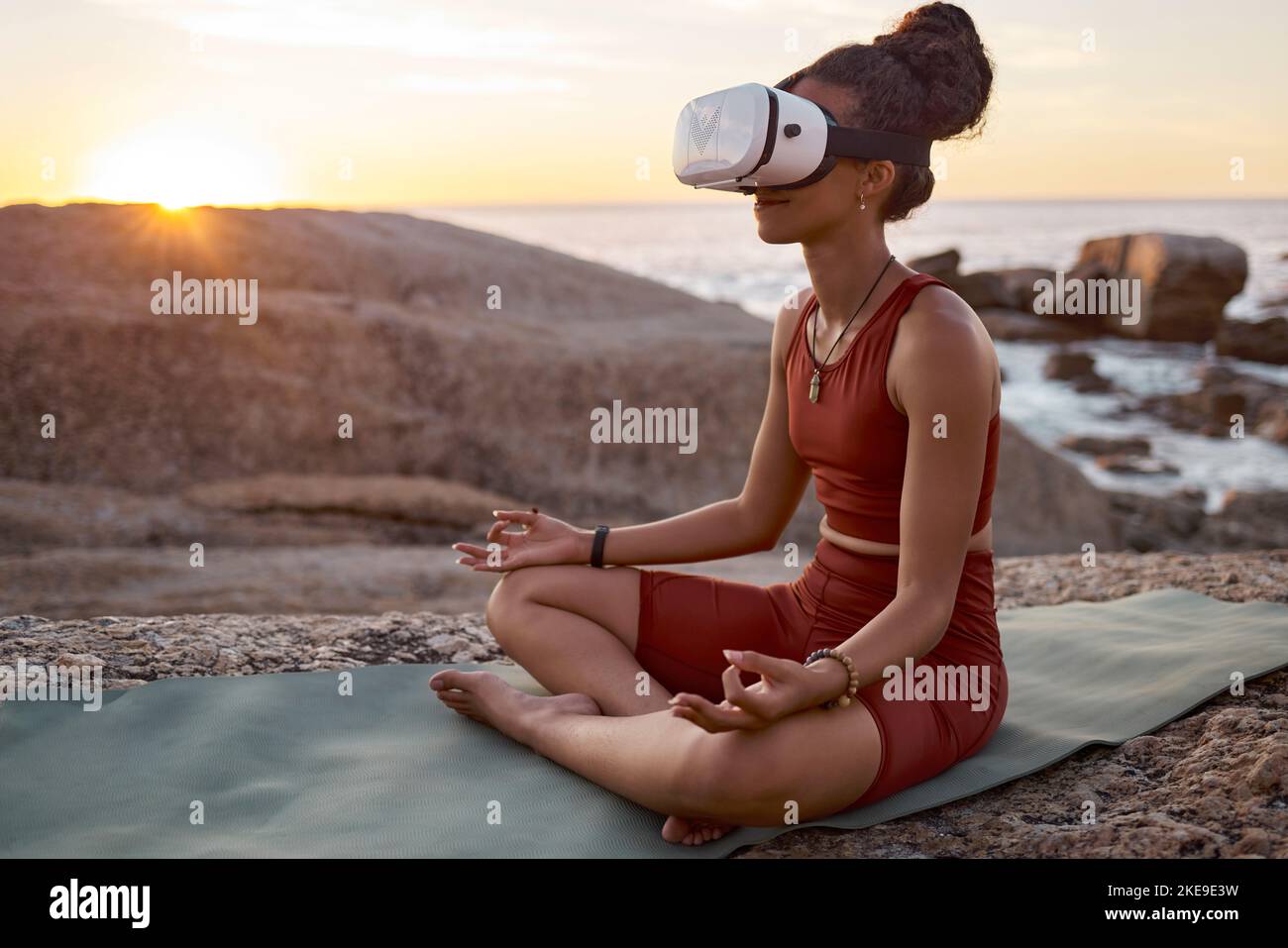 Woman Metaverse Or Vr Headset In Yoga Meditation By Beach Ocean Waves Woman metaverse or vr headset in yoga meditation by beach ocean waves