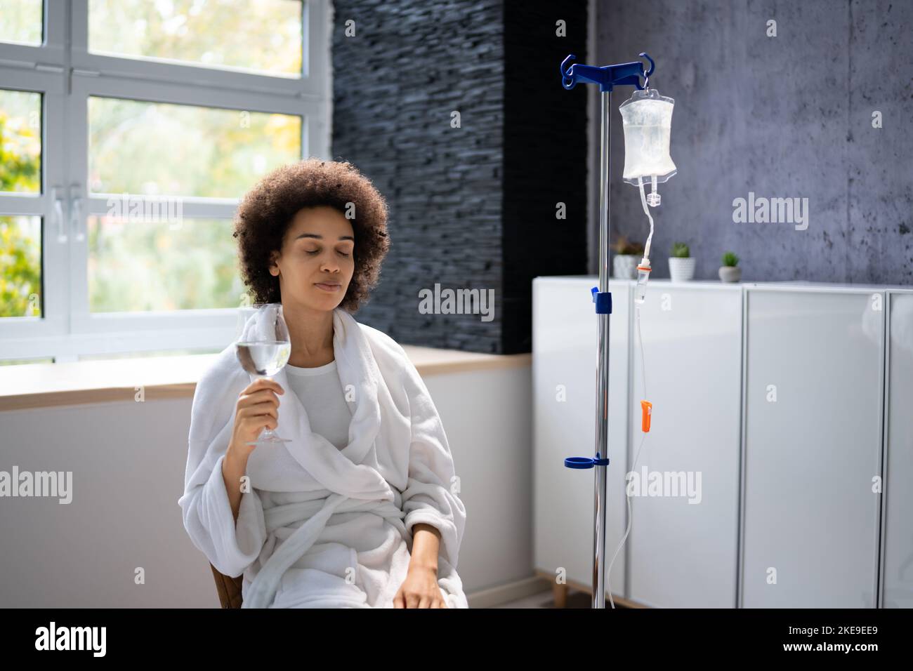 Vitamin Therapy IV Drip Infusion In Women Blood Stock Photo