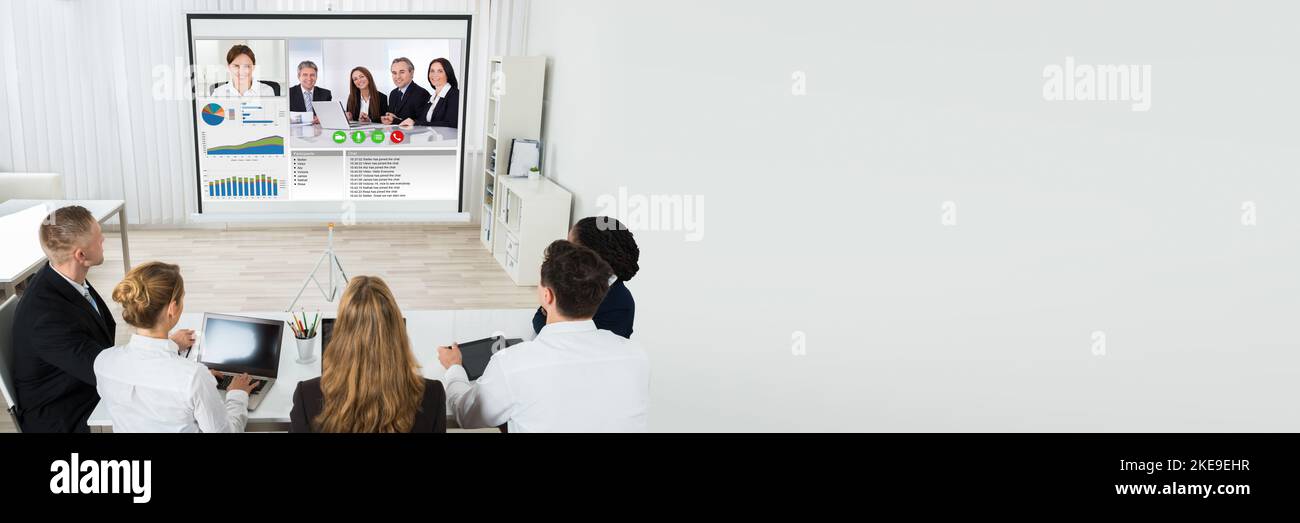 Video Conference Call In Meeting Room. Elearning Videoconference Stock Photo