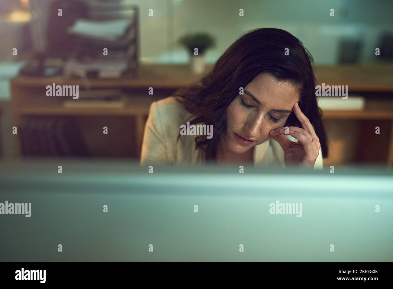 The long hours are beginning to wear her out. a stressed out