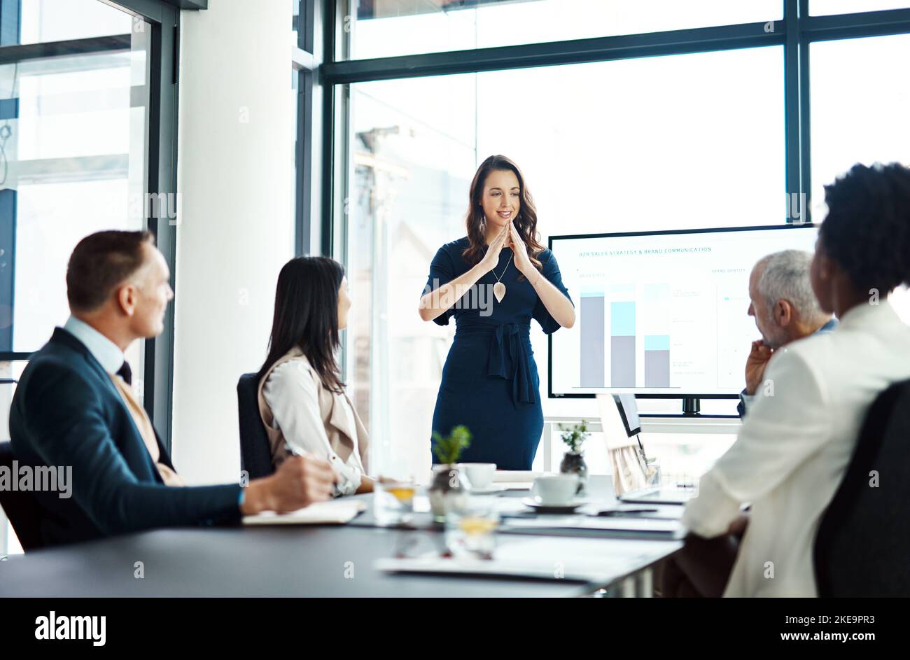 Shes handling this presentation perfectly. a businesswoman giving a
