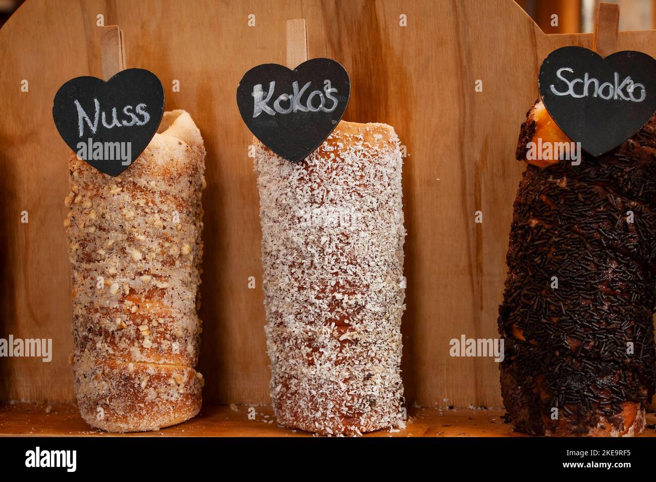A closeup of sweets with names on display Stock Photo Alamy