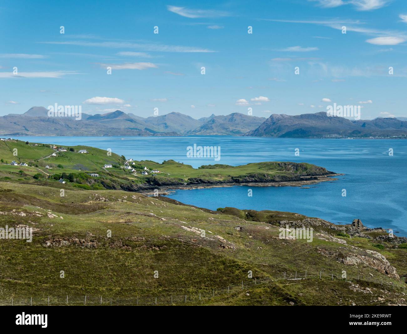 The tiny remote, coastal village of An Aird near Armadale on the Sleat Peninsula on the Isle of Skye with the Sound of Sleat beyond, Scotland, UK Stock Photo