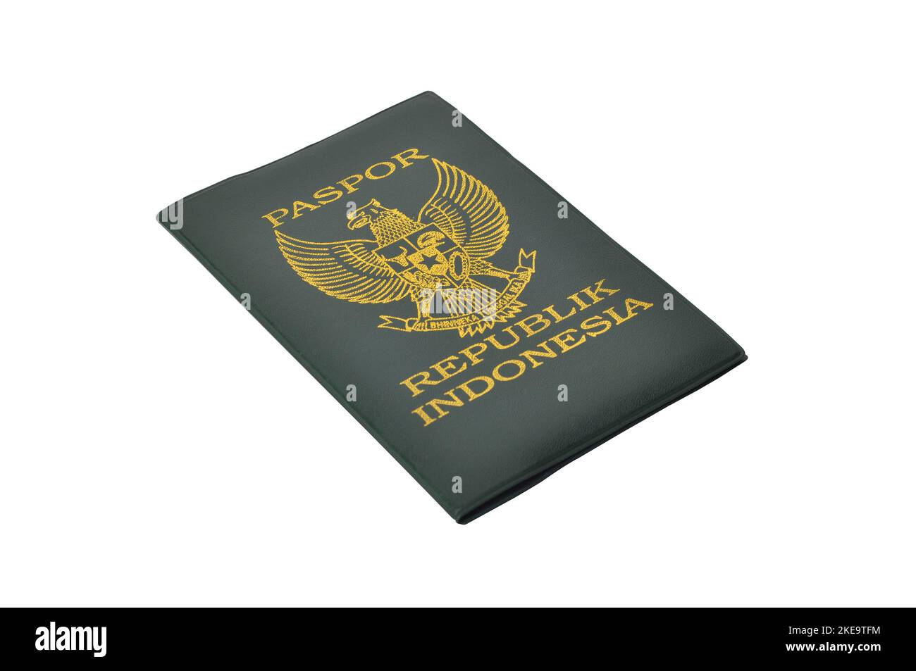 Republic of Indonesia passport book with green cover on white background Stock Photo