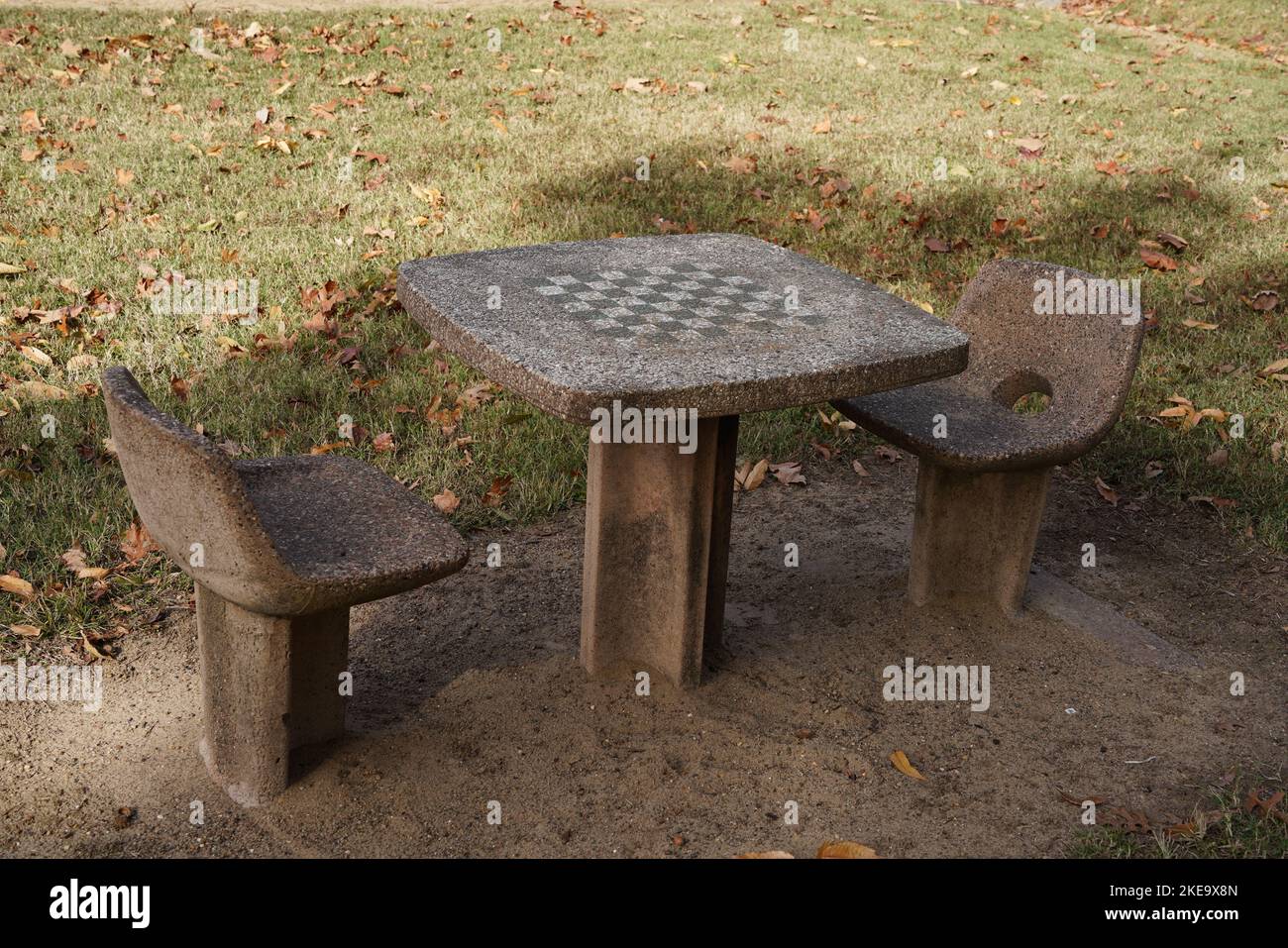 Outdoor Concrete Chess and Checker board table and chairs Stock Photo
