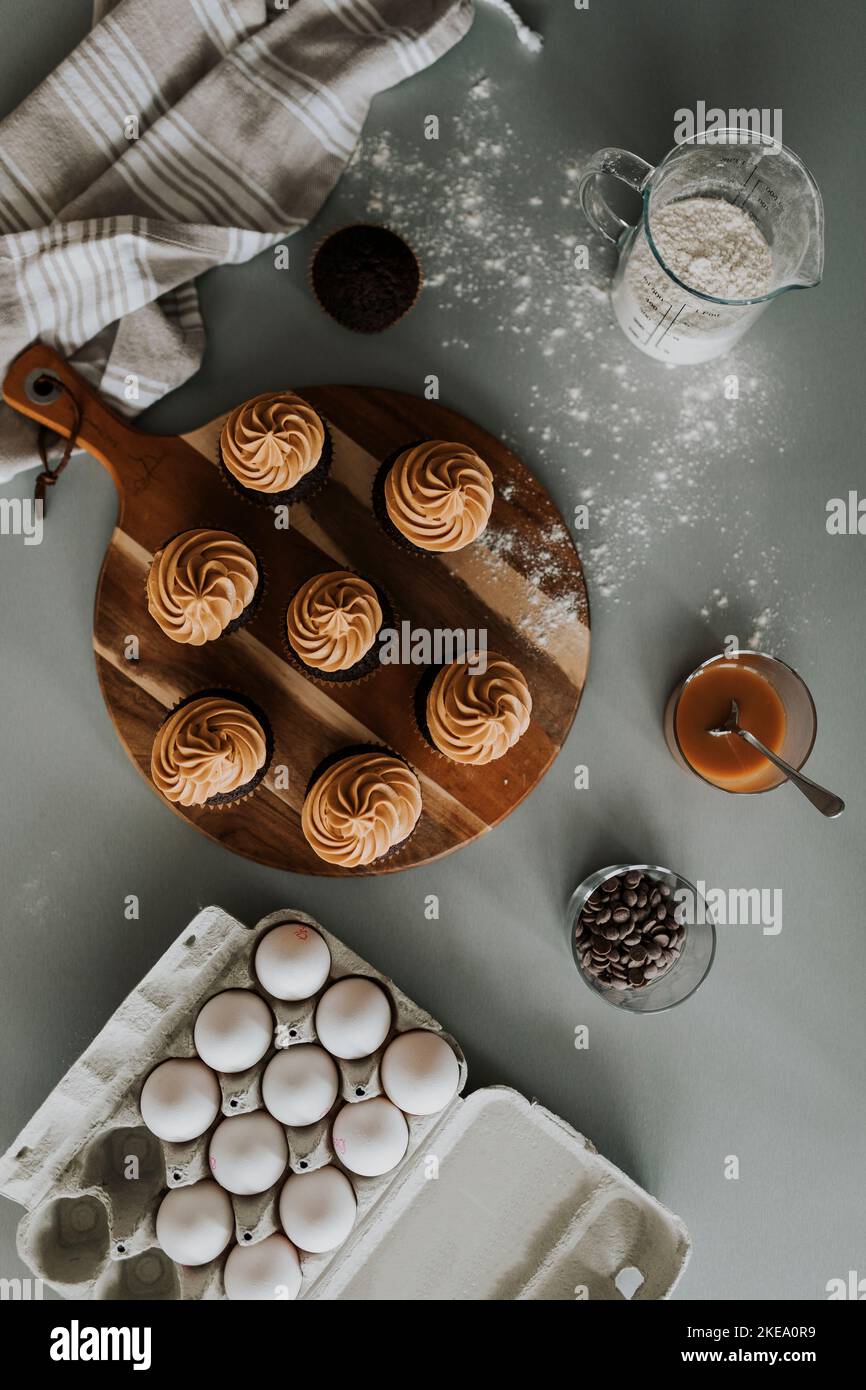 Cupcakes on wooden board Stock Photo