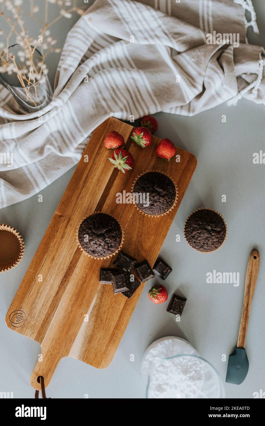Cupcakes on wooden board Stock Photo