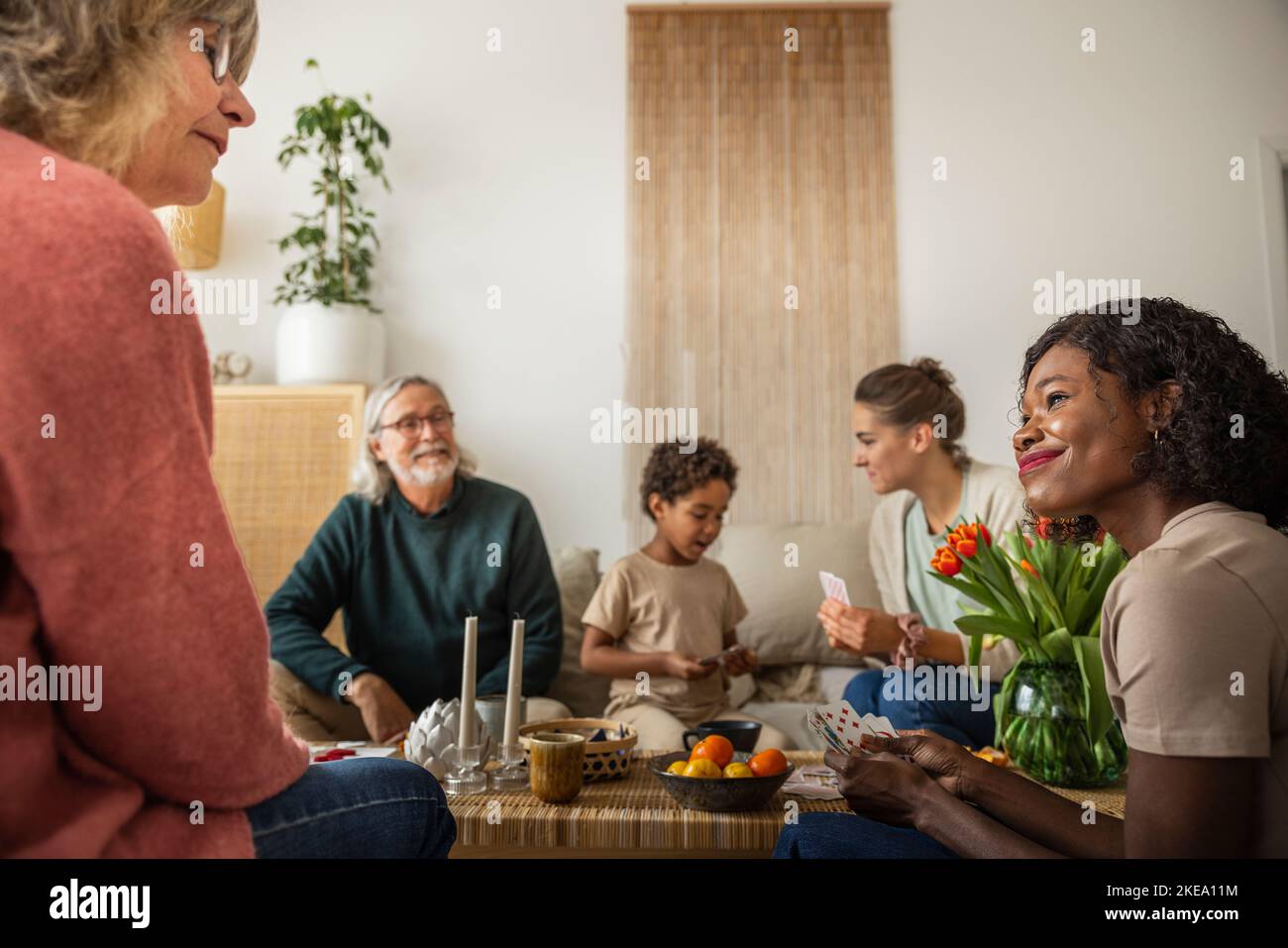family-playing-cards-at-home-stock-photo-alamy