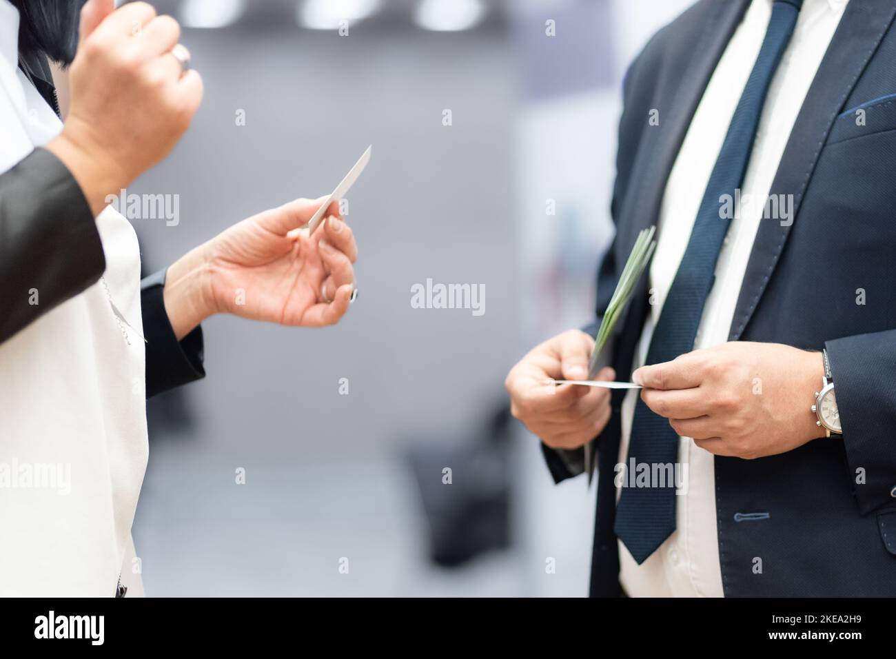 Business people exchanging business card on business meeting, Business discussion talking deal concept. Stock Photo