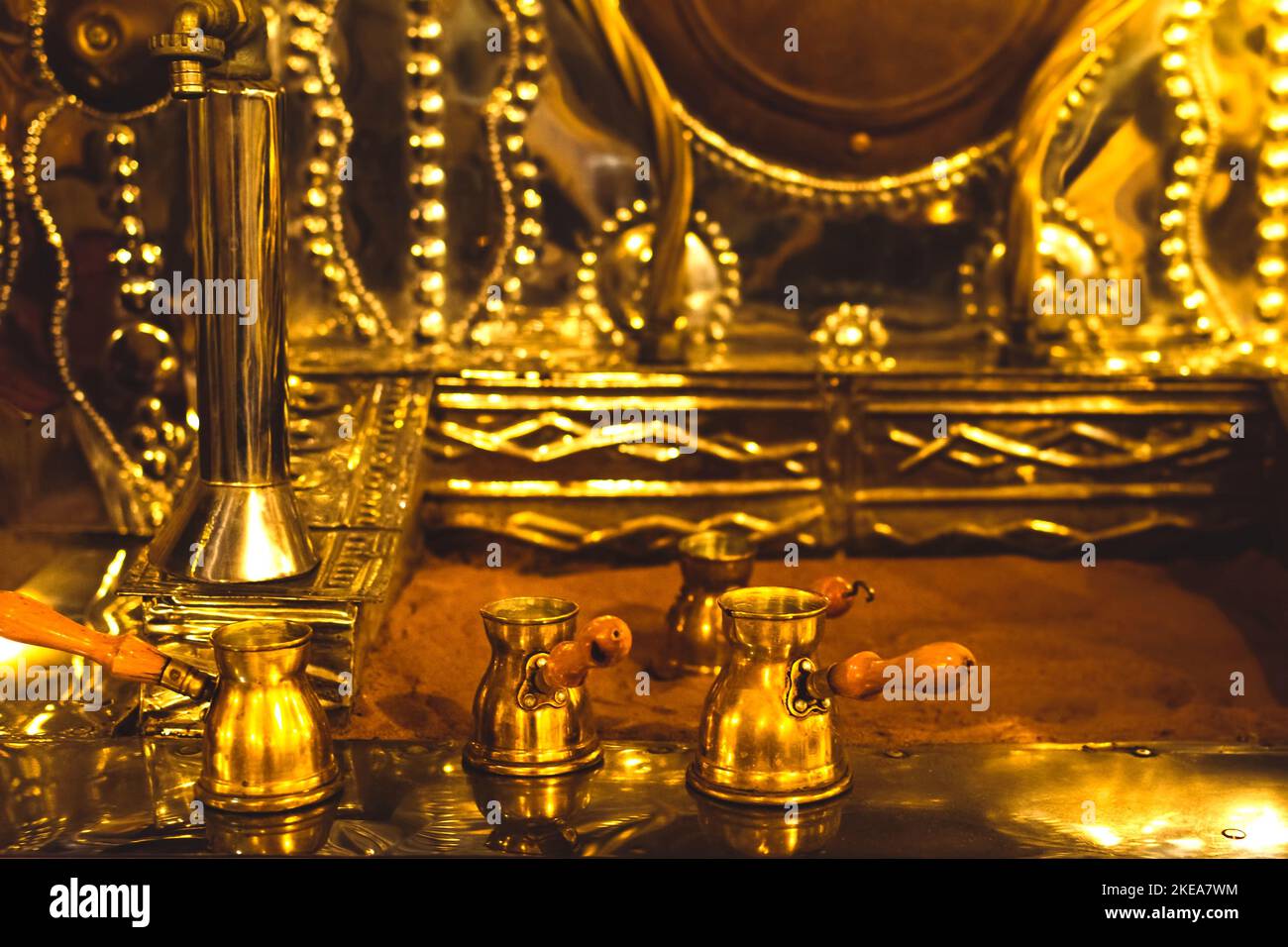 Dubai, UAE 12th october, 2022 golden coffee pots with hot sand