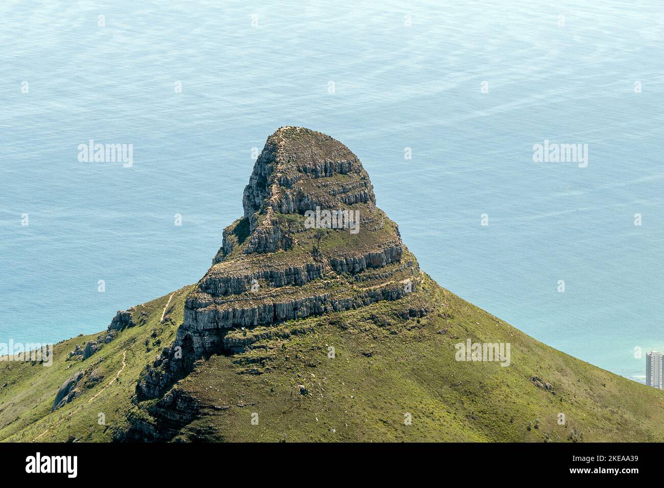 Lions Head as seen from Table Mountain in Cape Town. The hiking trail to the top is visible Stock Photo