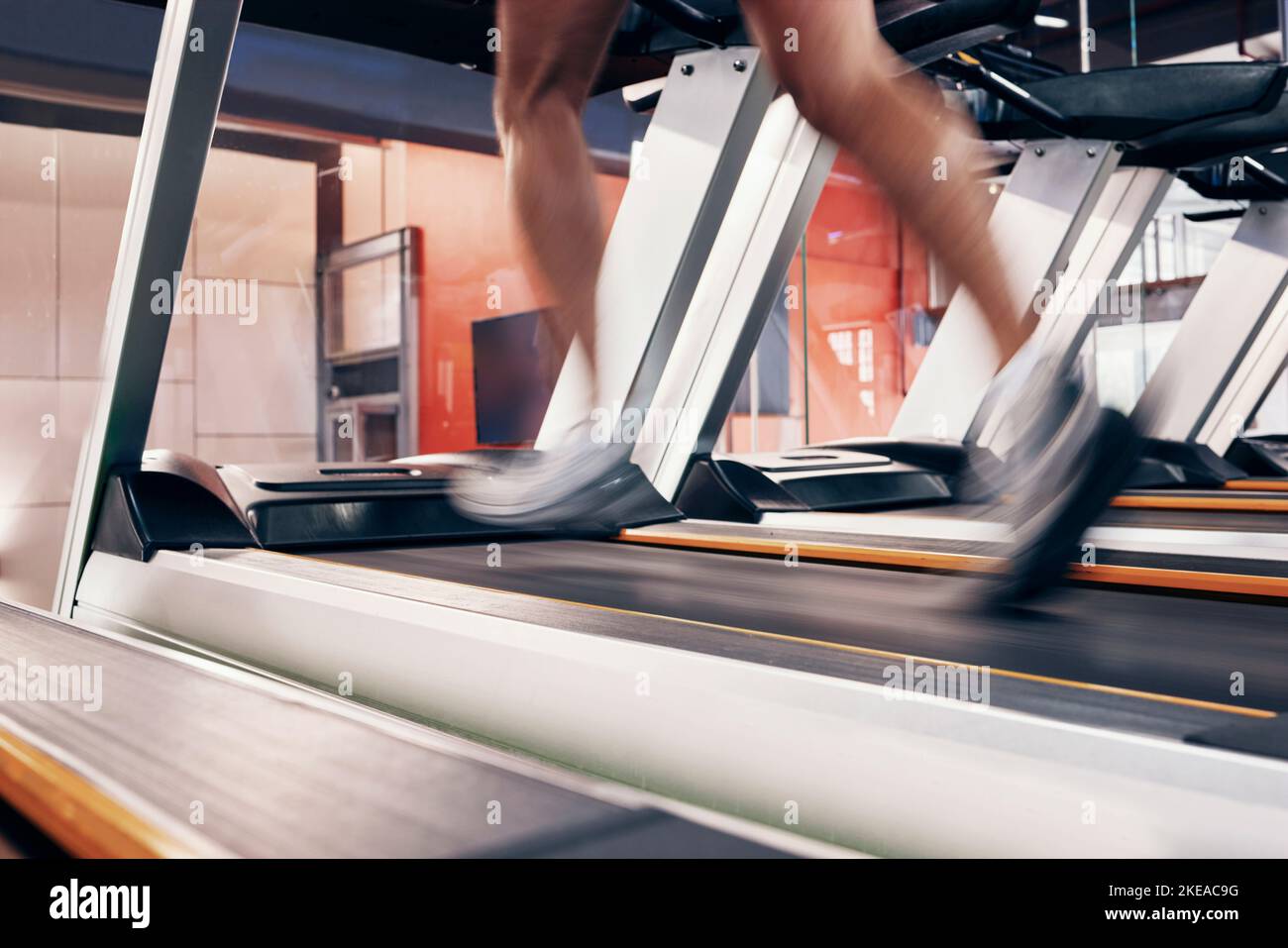 Fitness, treadmill with man running on machine for exercise, cardio