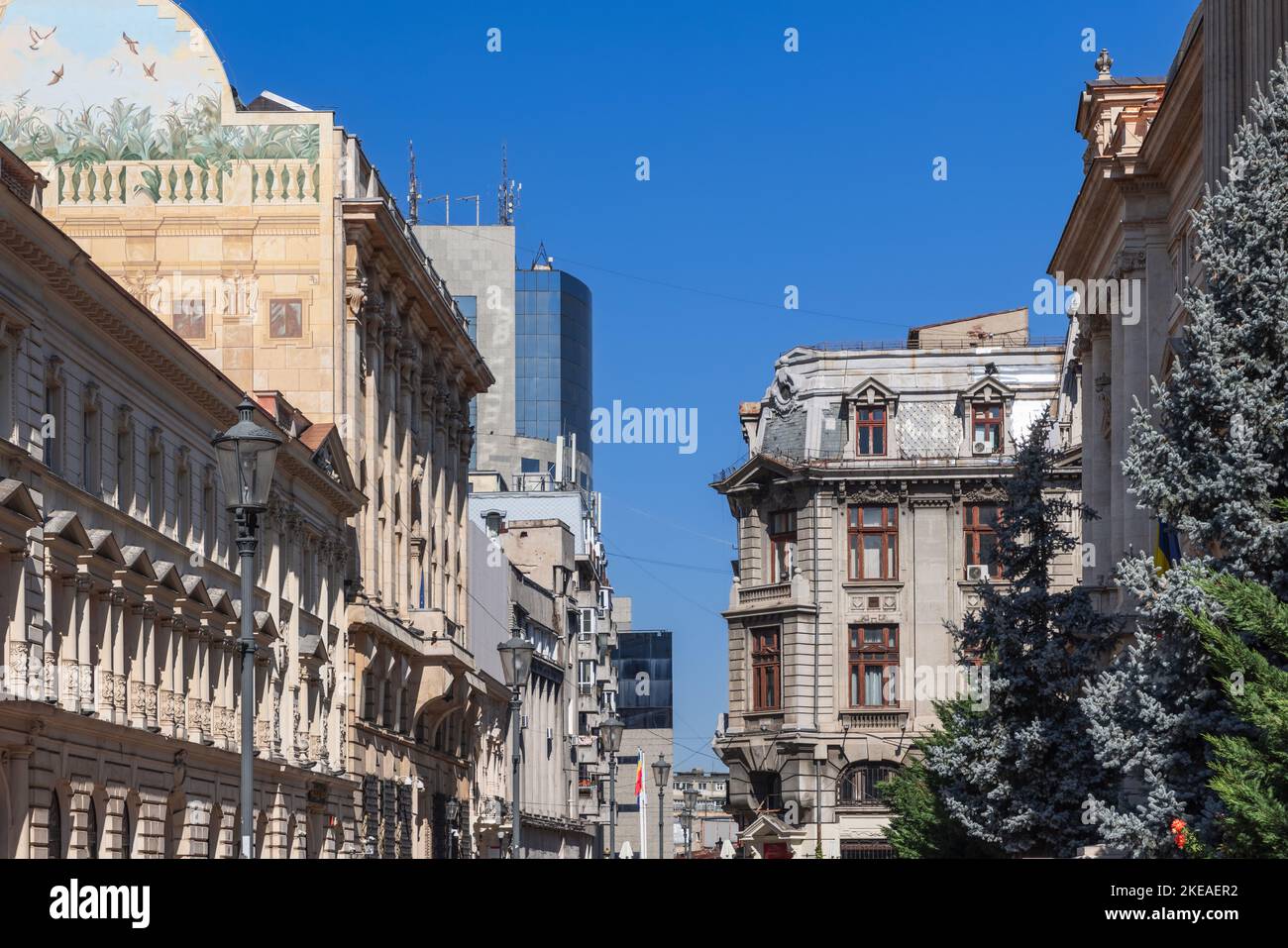 Buildings on Strada Ion Ghica are eclectic but tending to neoclassical architectural style, big bank offices, prestigious hotels and souvenir shops ar Stock Photo