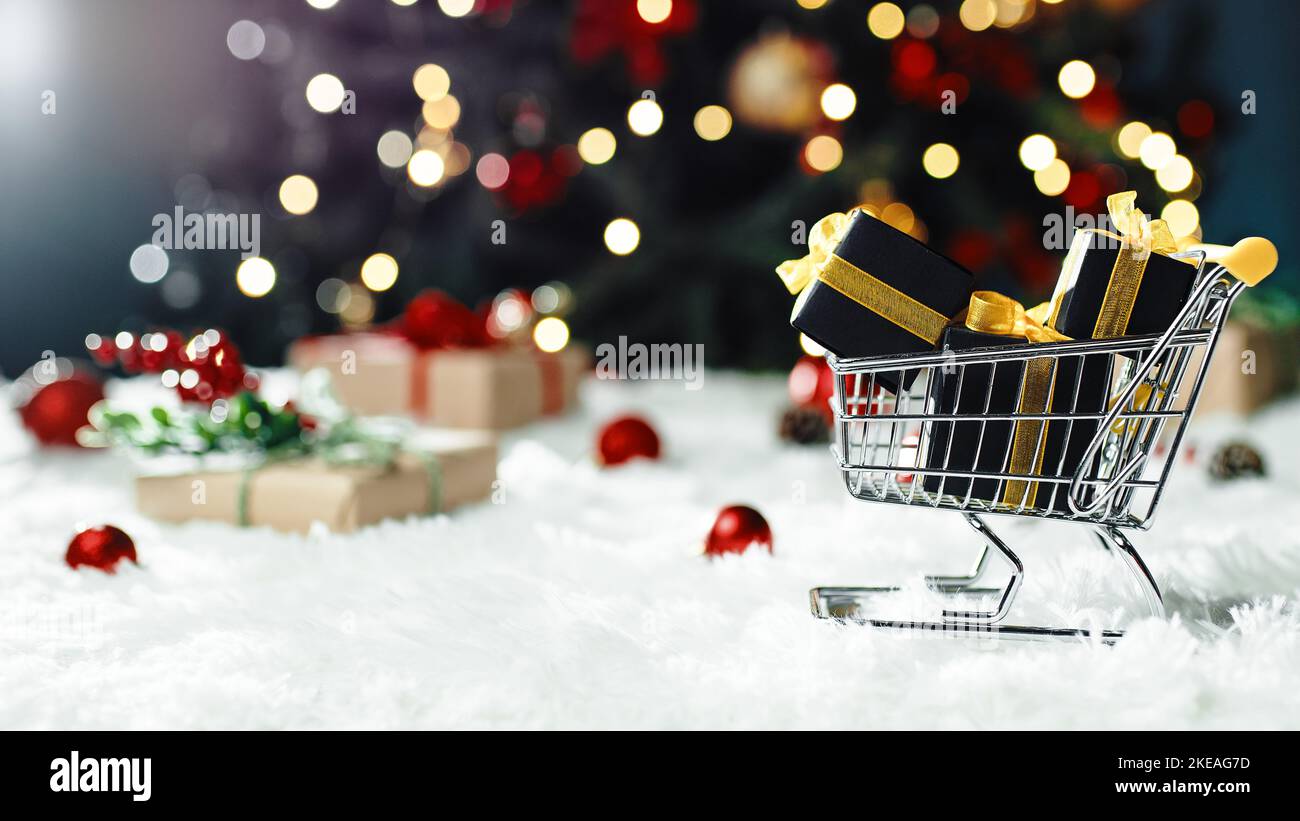Shopping cart with Christmas gifts box Stock Photo