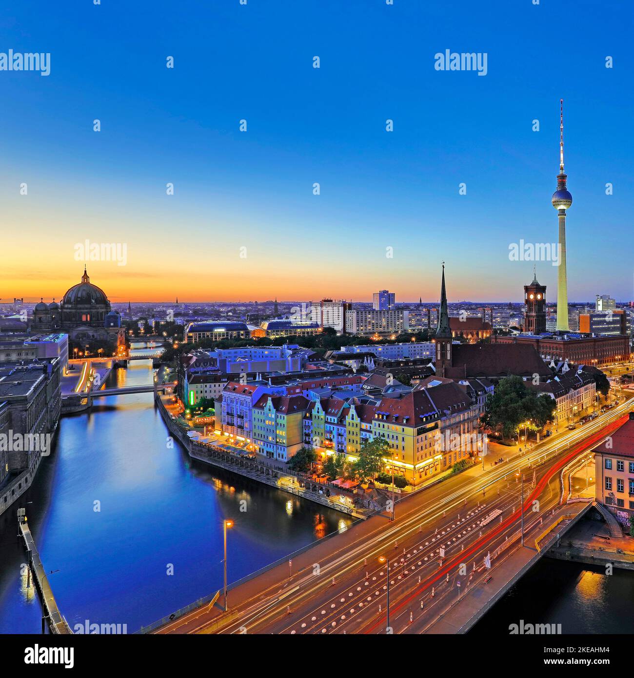 City panorama with Spree, Cathedral, Nikolai District, Rotes Rathaus, television tower and Altes Stadthaus in the evening, Berlin-Mitte, Germany, Stock Photo
