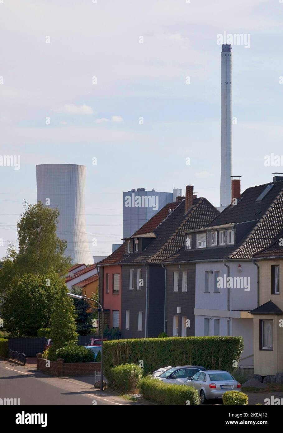 Residential buildings in front of the combined heat and power plant Herne, Germany, North Rhine-Westphalia, Ruhr Area, Herne Stock Photo