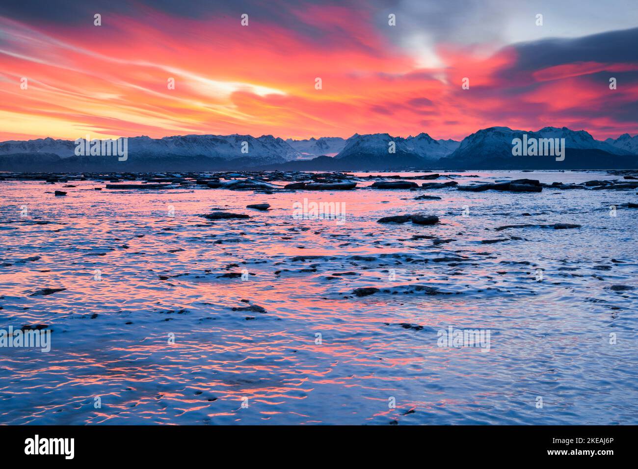 Morning mood over frozen Kachemak Bay with the Kenai Mountains in the background, USA, Alaska, Kenai Peninsula, Kachemak Bay Stock Photo