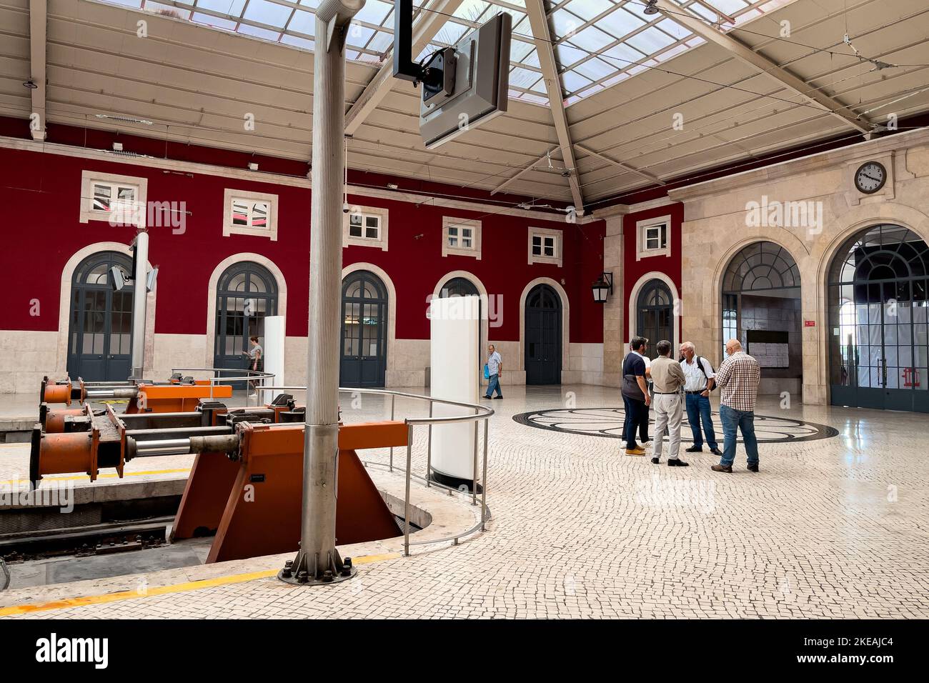 People waiting inside Santa Apolonia railway station Stock Photo Alamy