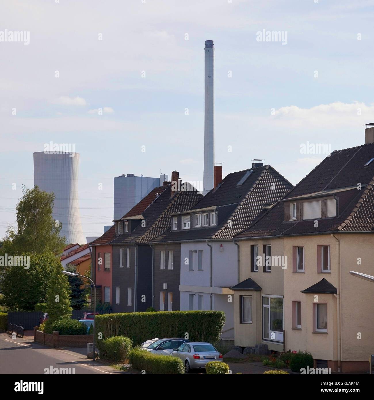 Residential buildings in front of the combined heat and power plant Herne, Germany, North Rhine-Westphalia, Ruhr Area, Herne Stock Photo