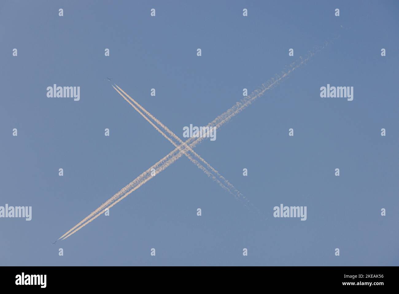 air traffic, two contrails crossing in the sky, Germany, Bavaria Stock Photo