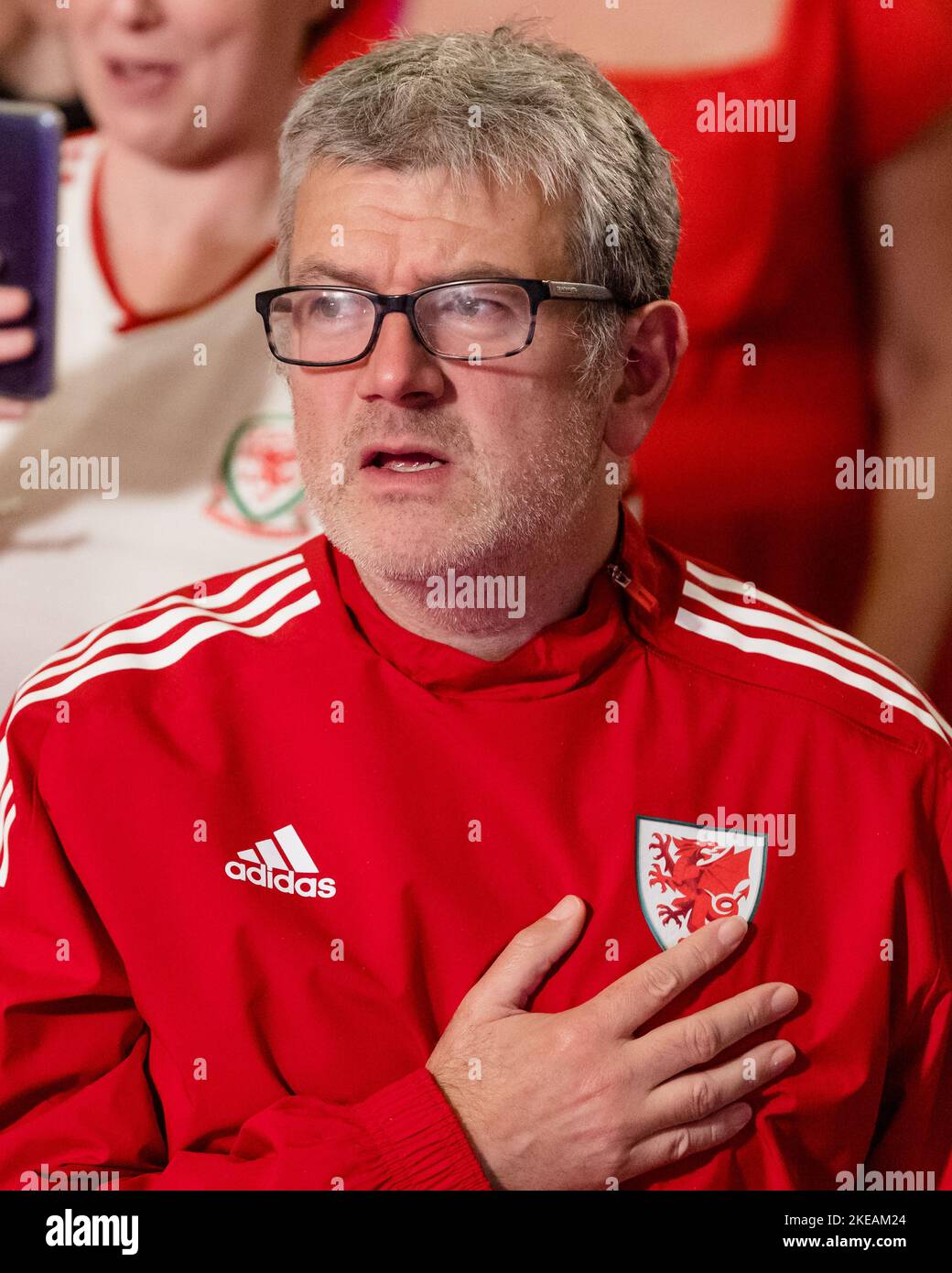 RHONDDA, WALES 09 NOVEMBER 2022 Fans sing the national anthem as