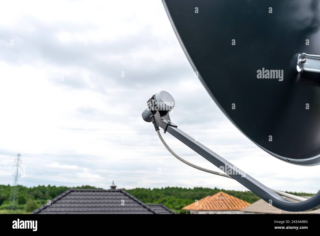 Chimney holder for mounting a satellite dish on the chimney, visible
