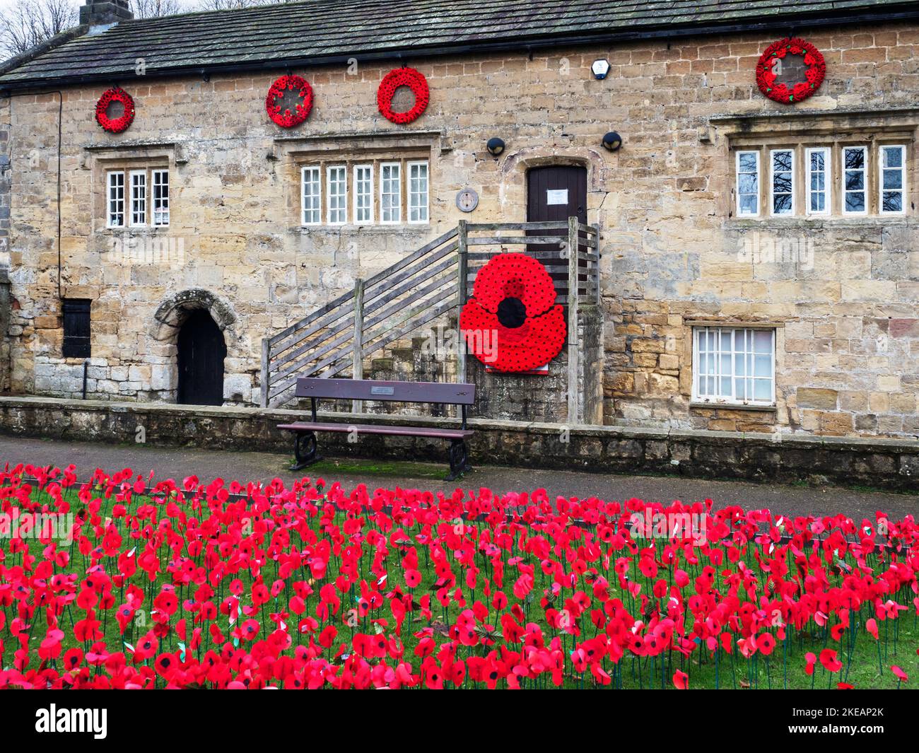 Remembrance poppies at the Courthouse Museum in the castle grounds at Knaresborough North Yorkshire England Stock Photo