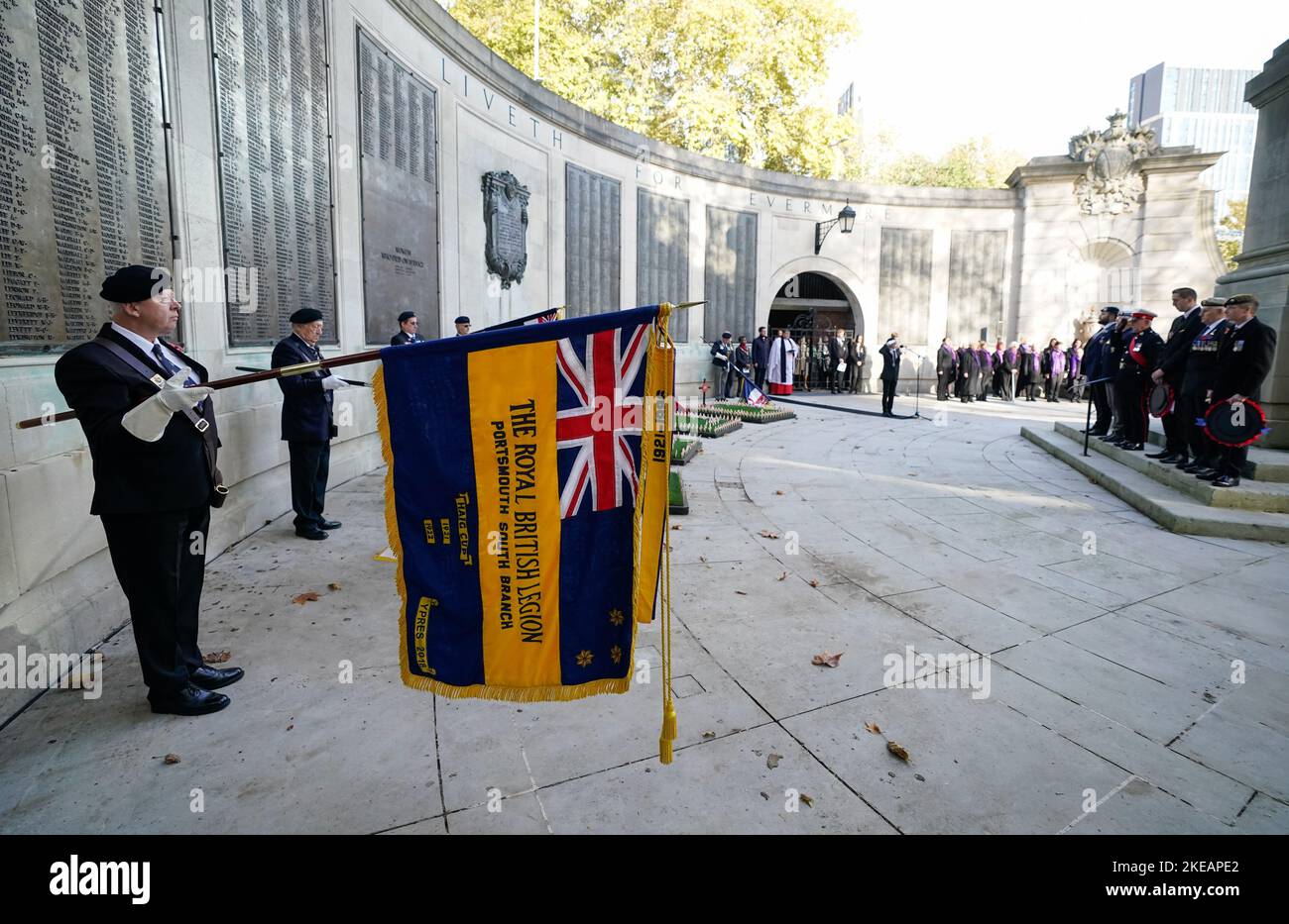 Standard bearers lower their standards at the start of a two minute