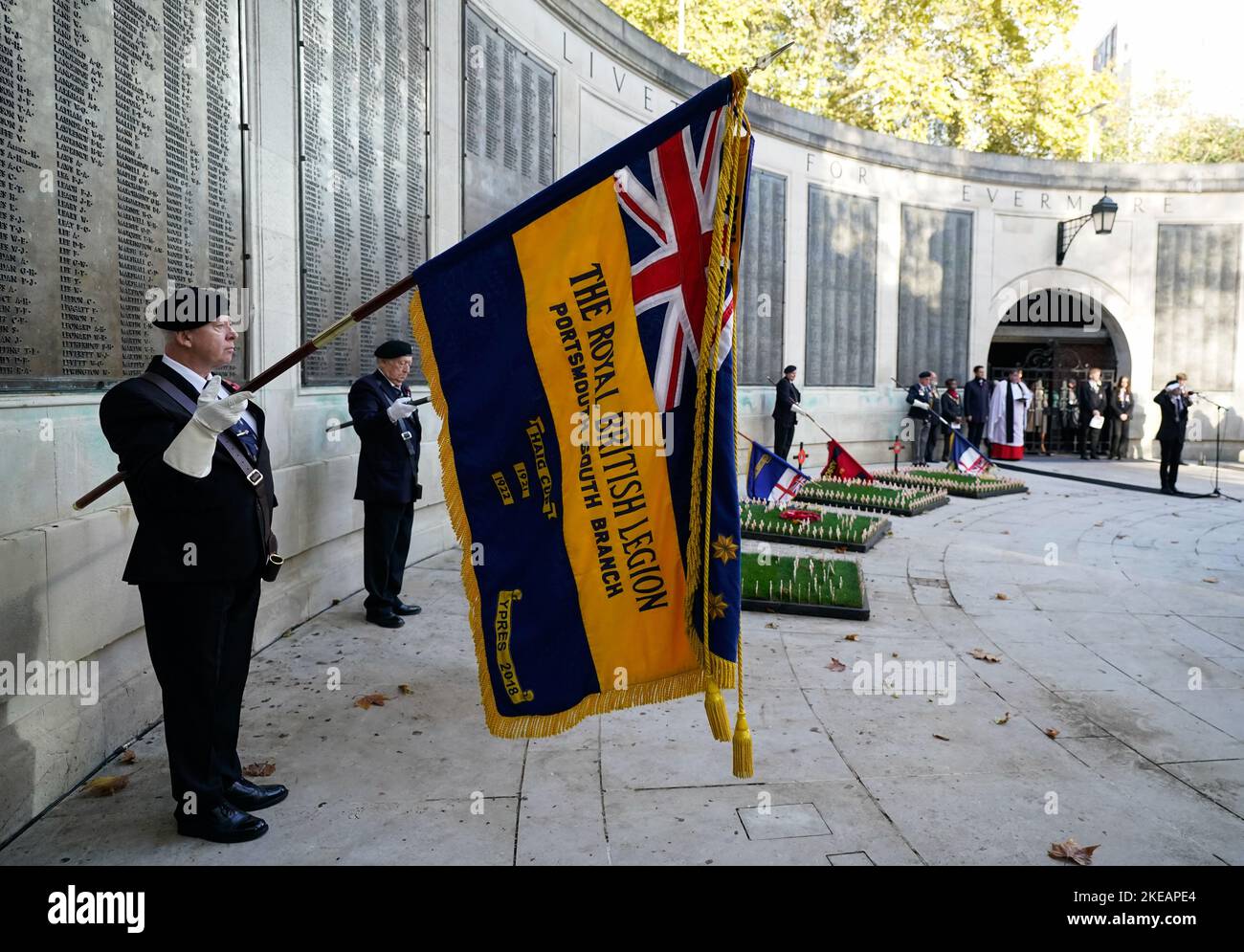 Standard bearers lower their standards at the start of a two minute