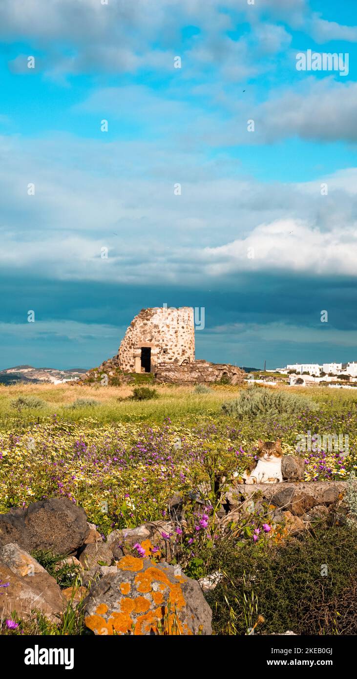 A vertical of an old ruined building under a cloudy sky in Greece Stock ...