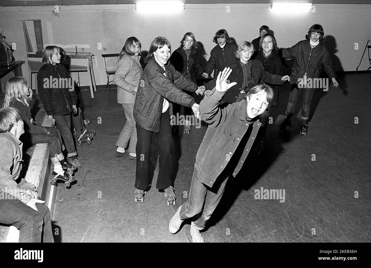 Roller skate fun in the 1960s. Interior of a roller disco with people