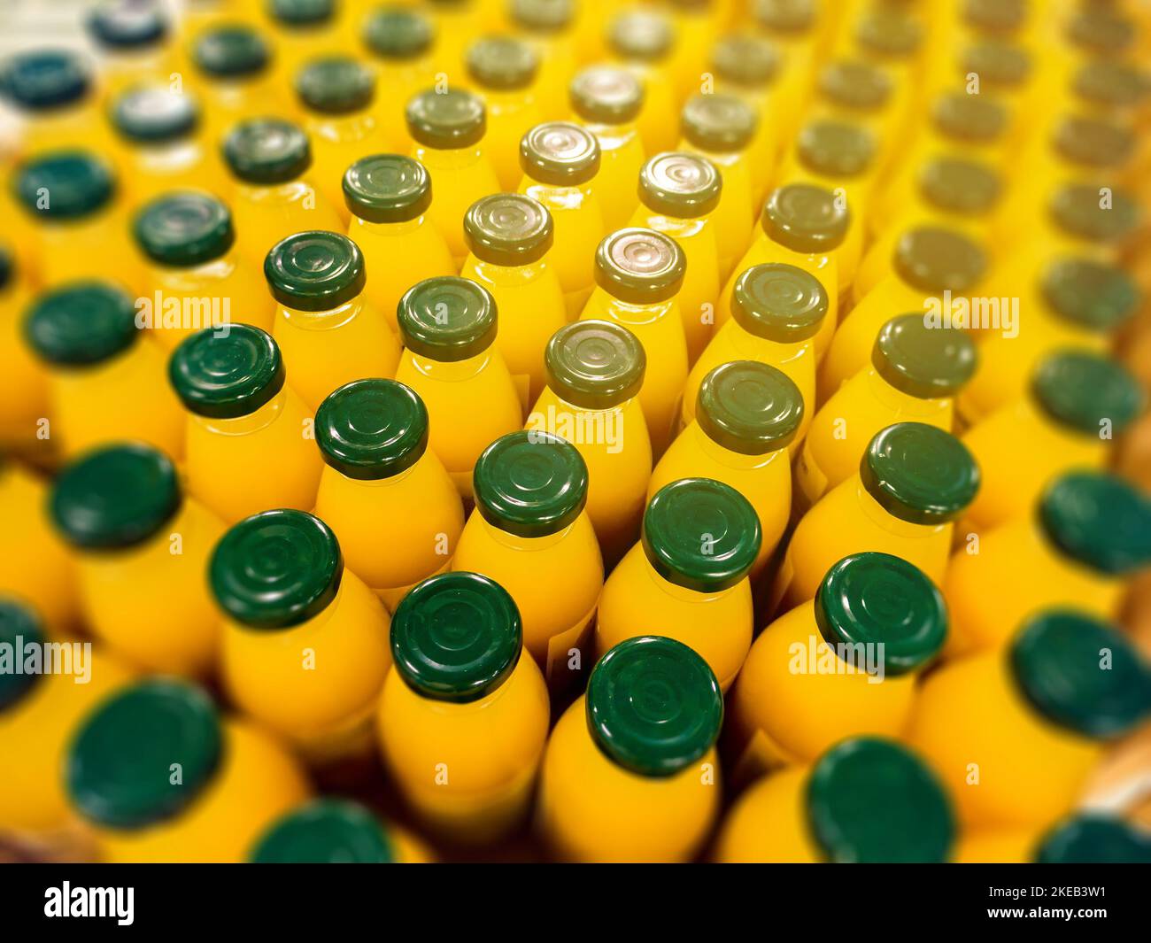 Fresh fruit juice in small glass bottles. Organic orange juice. A