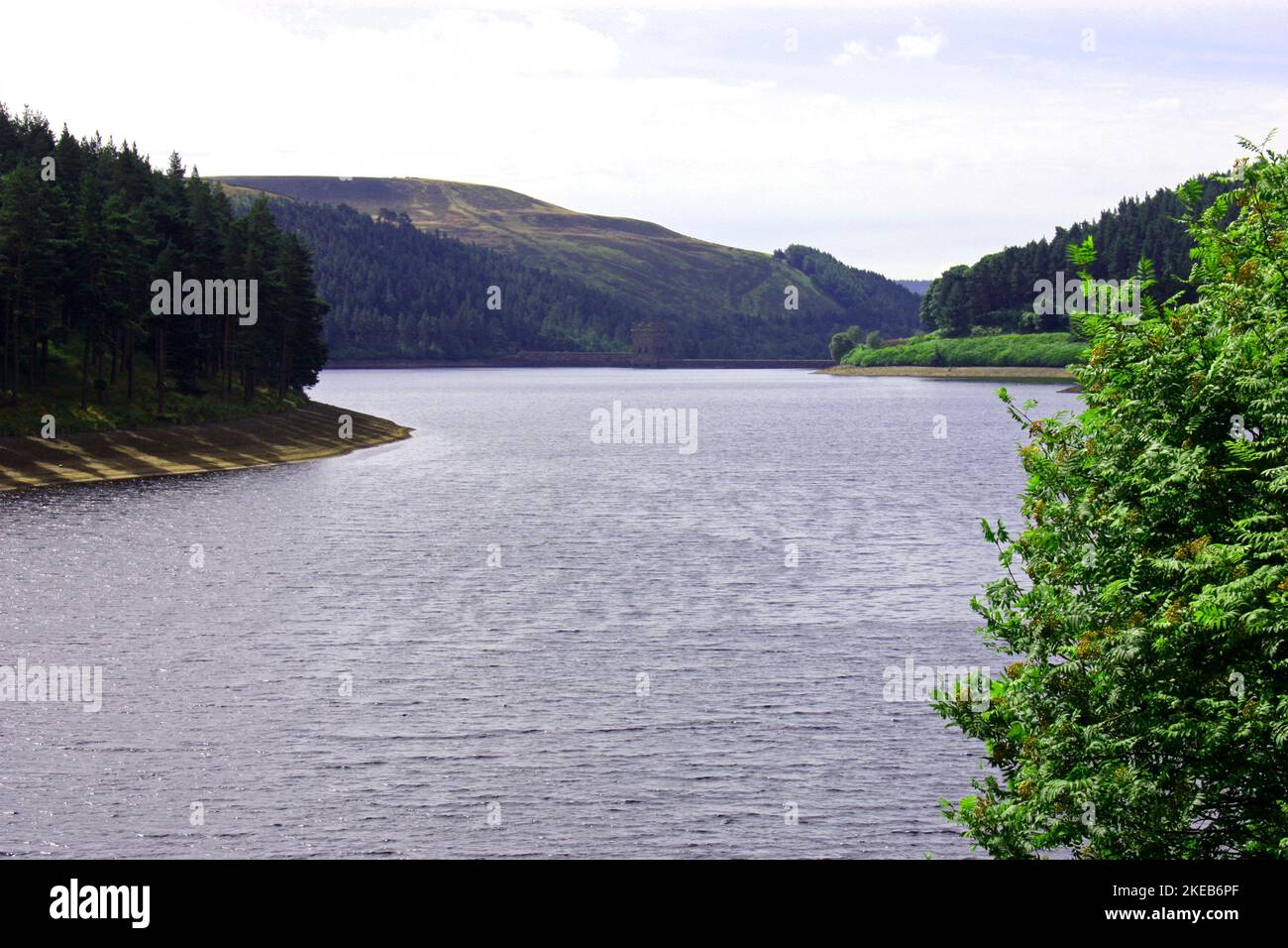 A View of a Large Water Reservoir and Stone Built Dam. Stock Photo