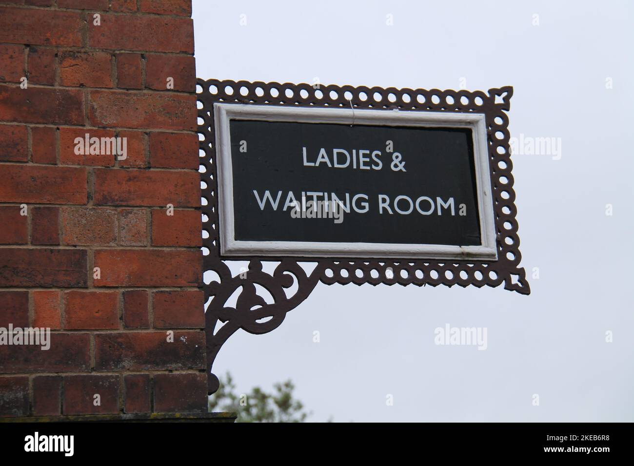 The Ladies and Waiting Room Sign at a Train Station. Stock Photo