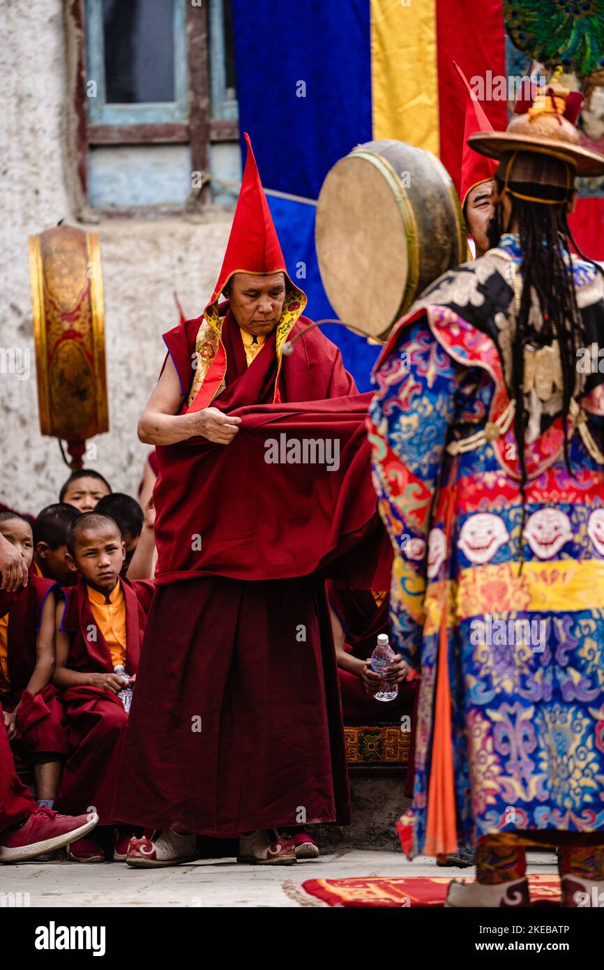 A vertical shot of Tibetan Buddhist monks in Ritual Dance at the Tiji ...